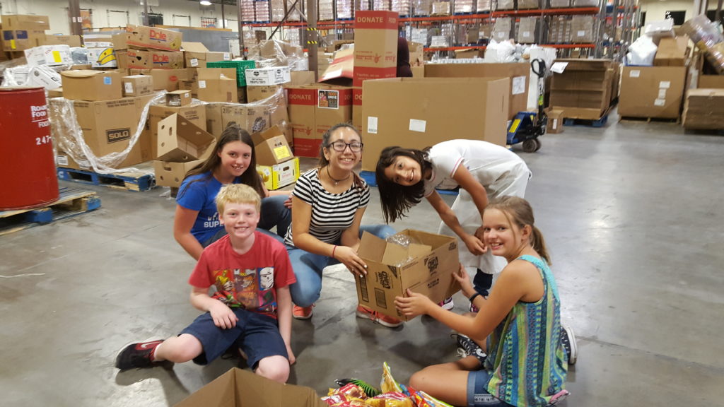 "God's Work, Our Hands" at the New Mexico Roadrunner Food Bank